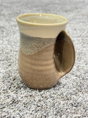 Handmade Neher hand warming Ceramic Coffee Mug in Cream and Brown.  Right handed